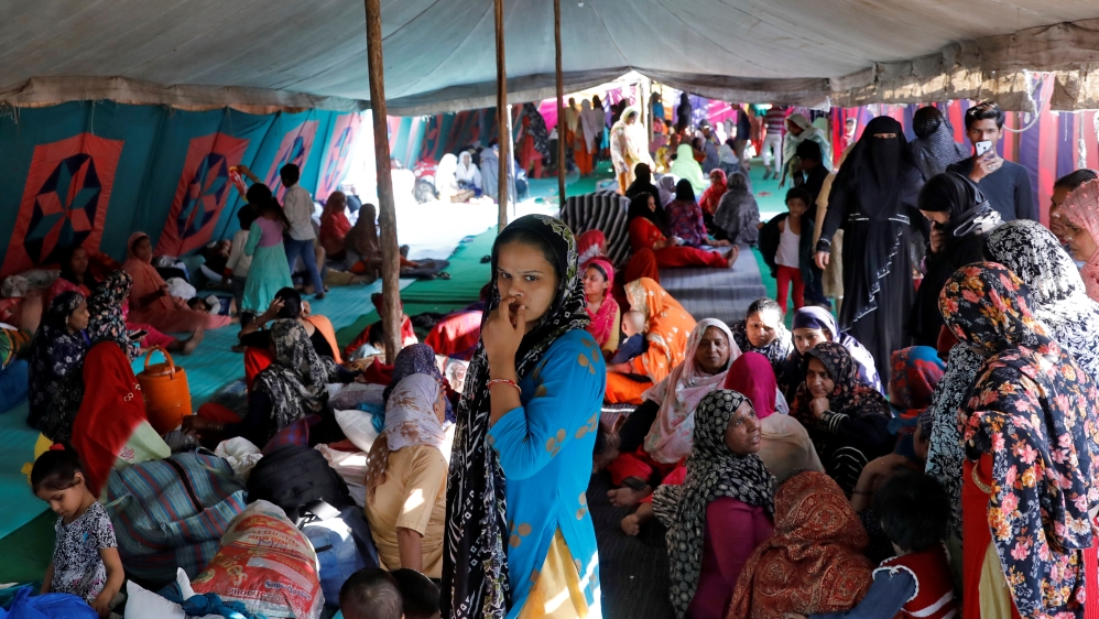 Muslims sit inside a relief camp in Mustafabad in the riot-affected northeast of New Delhi