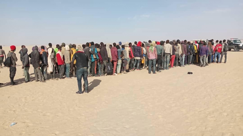 Migrants receiving assistance in Madama, a military outpost close to the border between Niger and Libya [ Courtesy: IOM Niger]
