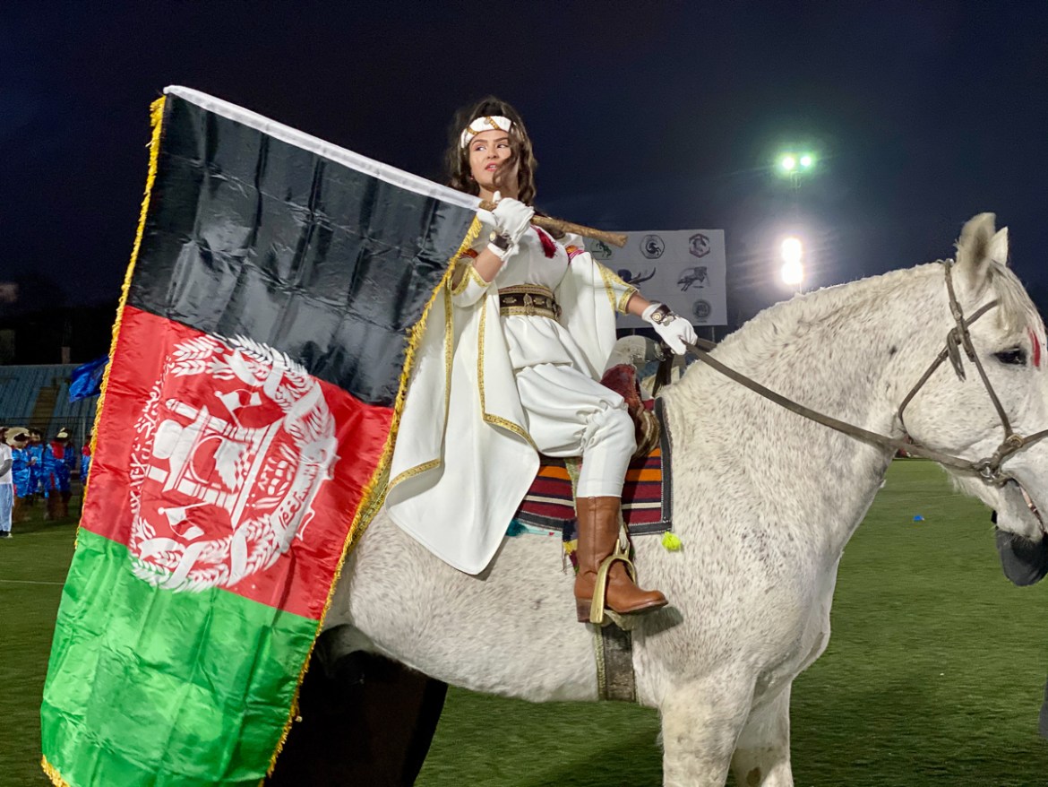 An Afghan woman horse rider opened the first-ever Afghan Buzkashi League on March 7, in Ghazi stadium, which