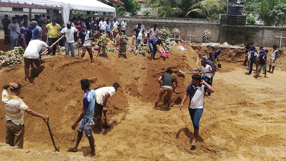 The mass grave in Negombo where victims of the St. Sebastian’s Church bombing were laid to rest. [Aanya Erinyes/Al Jazeera]