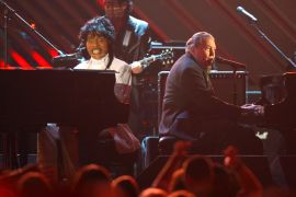 FILE PHOTO: Little Richard (L) and Jerry Lee Lewis perform at the 50th Annual Grammy Awards in Los Angeles February 10, 2008. REUTERS/Mike Blake (UNITED STATES)/File Photo