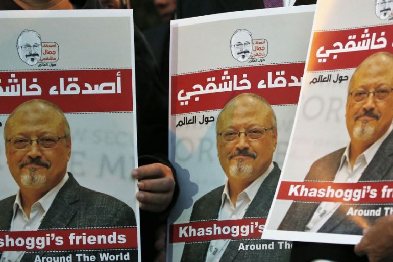 Activists protesting the killing of Saudi journalist Jamal Khashoggi hold a candlelight vigil outside Saudi Arabia''s consulate in Istanbul, Thursday, Oct. 25, 2018. The posters read in Arabic:''