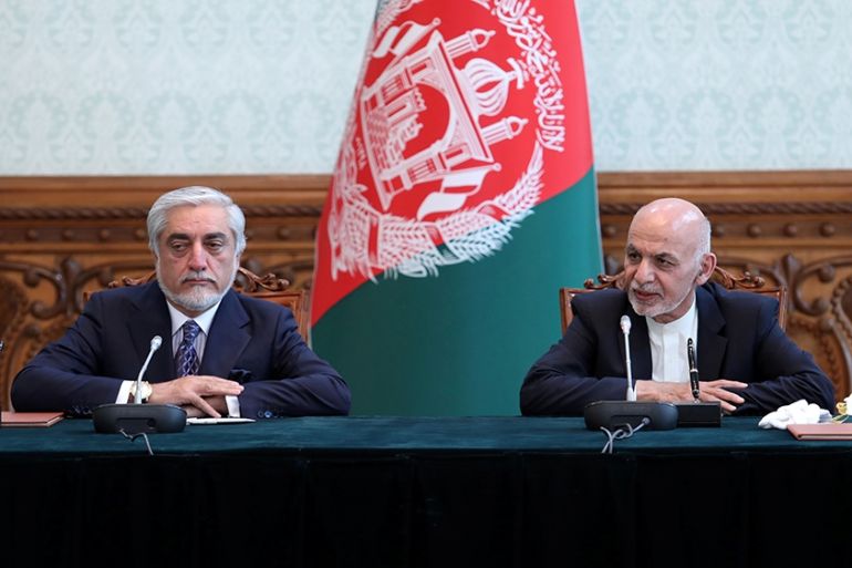 Afghanistan''s President Ashraf Ghani and his rival Abdullah Abdullah attend a ceremony to sign a political agreement in Kabul, Afghanistan May 17, 2020. Afghan Presidential Palace/Handout via REUTERS