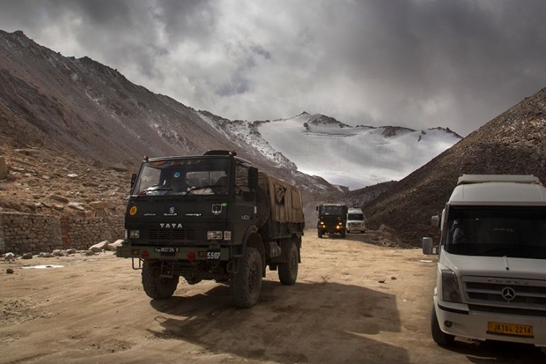 In this Sept. 14, 2018, photo, an Indian Army truck crosses Chang la pass near Pangong Lake in Ladakh region, India. Indian and Chinese soldiers are in a bitter standoff in the remote and picturesque