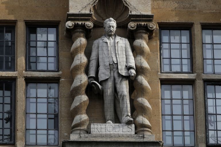 A statue of British businessman and imperialist Cecil John Rhodes is pictured outside Oriel College at the University of Oxford in Oxford, west of London on June 9, 2020, during a protest calling for