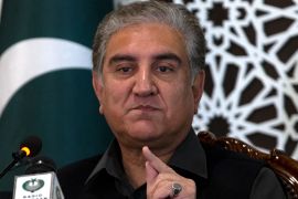 Pakistani Foreign Minister Shah Mahmood Qureshi speaks to reporters at the Foreign Ministry in Islamabad, Pakistan, Sunday, March 1, 2020. Qureshi said Sunday that after a concrete step in the form of