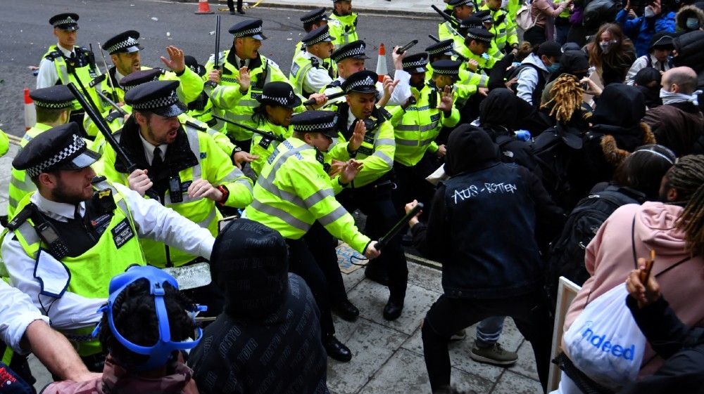 Police clash with demonstrators in Whitehall during a Black Lives Matter protest in London, following the death of George Floyd who died in police custody in Minneapolis,
