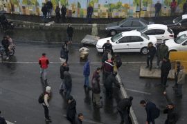 Protestors block a road after authorities raised gasoline prices, in Tehran, Iran on  November 16, 2019 [File: Majid Khahi/ISNA via AP] 