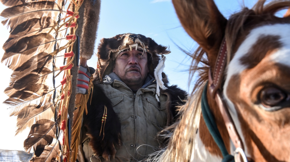 A descendant of the commander of the Wounded Knee massacre travels to Cheyenne River reservation to formerly apologize