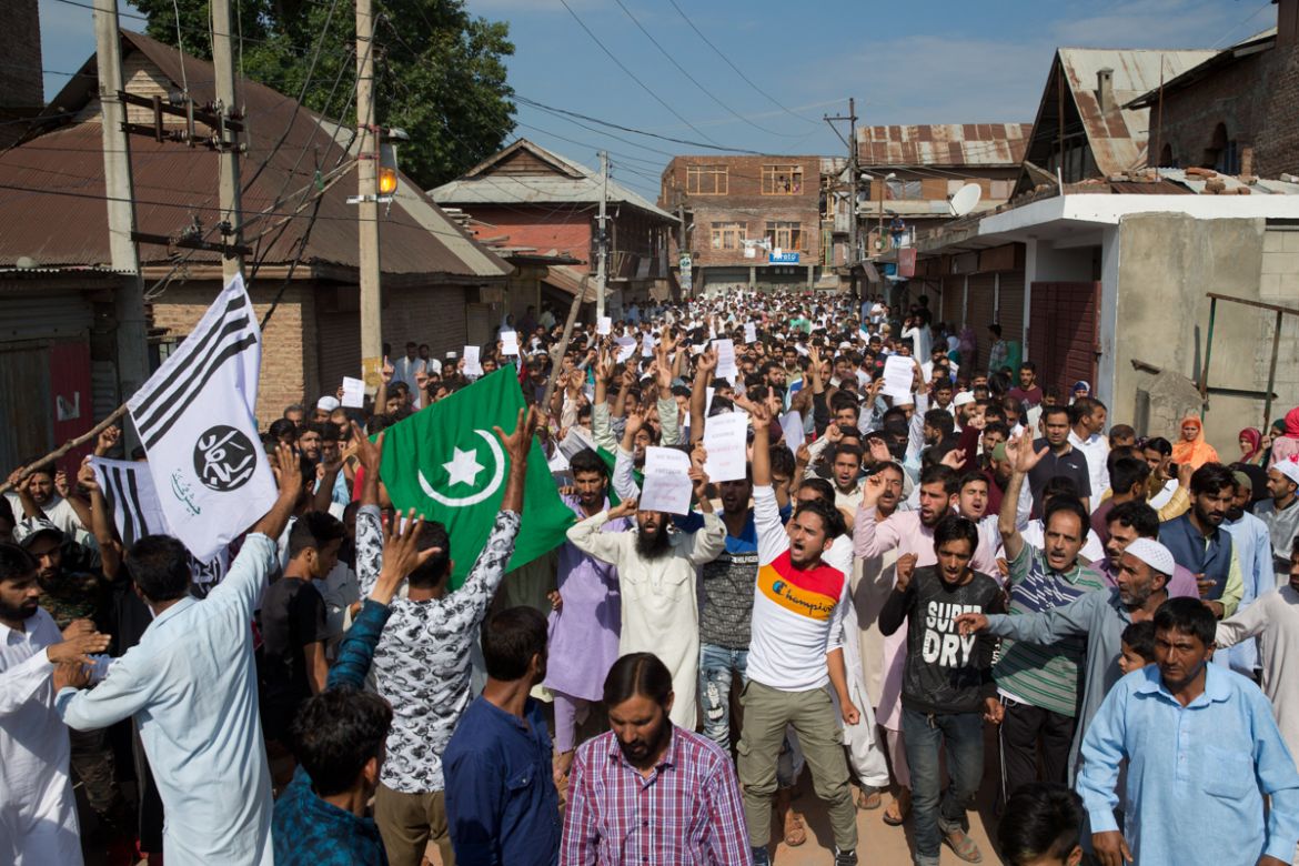 Kashmiri Muslims shout slogans during a protest after Eid prayers during a security lockdown in Srinagar, Indian controlled Kashmir, Monday, Aug. 12, 2019. Hundreds of worshippers gathered after the p