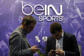 Visitors are seen at the French TV channel ''beIN Sport'' stand during the Sportel in Monte Carlo
