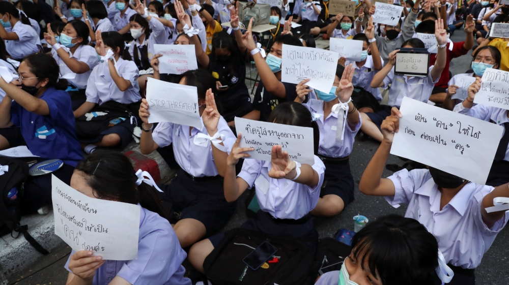 Students show support for the student-led democracy movement outside the Education Ministry in Bangkok