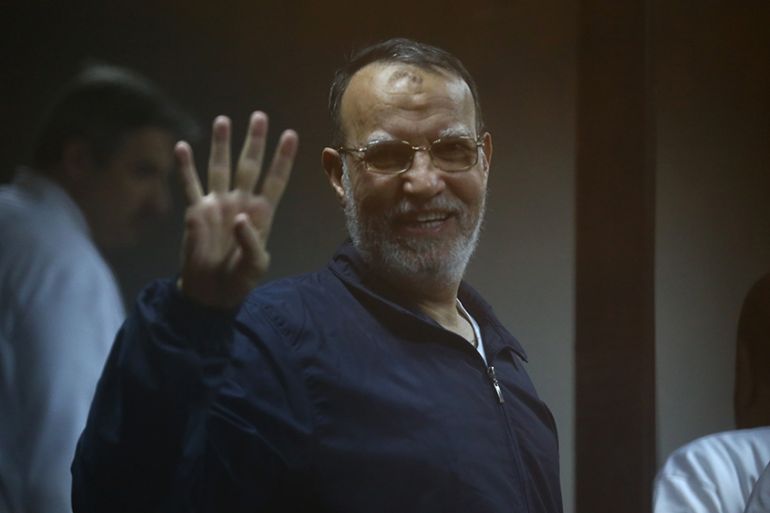 Egyptian Muslim Brotherhood senior member Essam al-Eryan stands inside the defendants'' cage during his trial at the police academy in Cairo on December 7, 2014. An Egyptian court sentenced to death fo