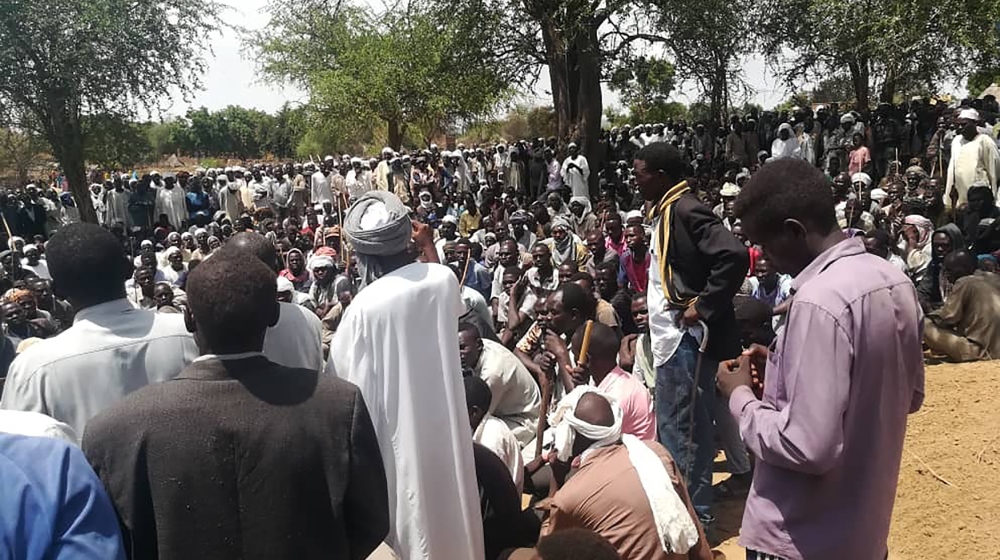Residents gather in mass funeral after an attack in the village of Masteri in west Darfur, Sudan Monday, July 27, 2020. A recent surge of violence in Darfur, the war-scarred region of western Sudan, h