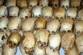 Human skulls are seen in this February 2004 file picture on the floor of the Ntarama church in Rwanda where several hundred people were slaughtered during the tiny central African country''s 1994 genoc