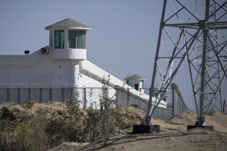 watchtowers on a high-security facility near what is believed to be a re-education camp in Xinjiang
