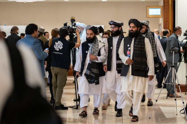 Members of the Taliban delegation attend the opening ceremony of the historic Intra-Afghan peace talks in Doha