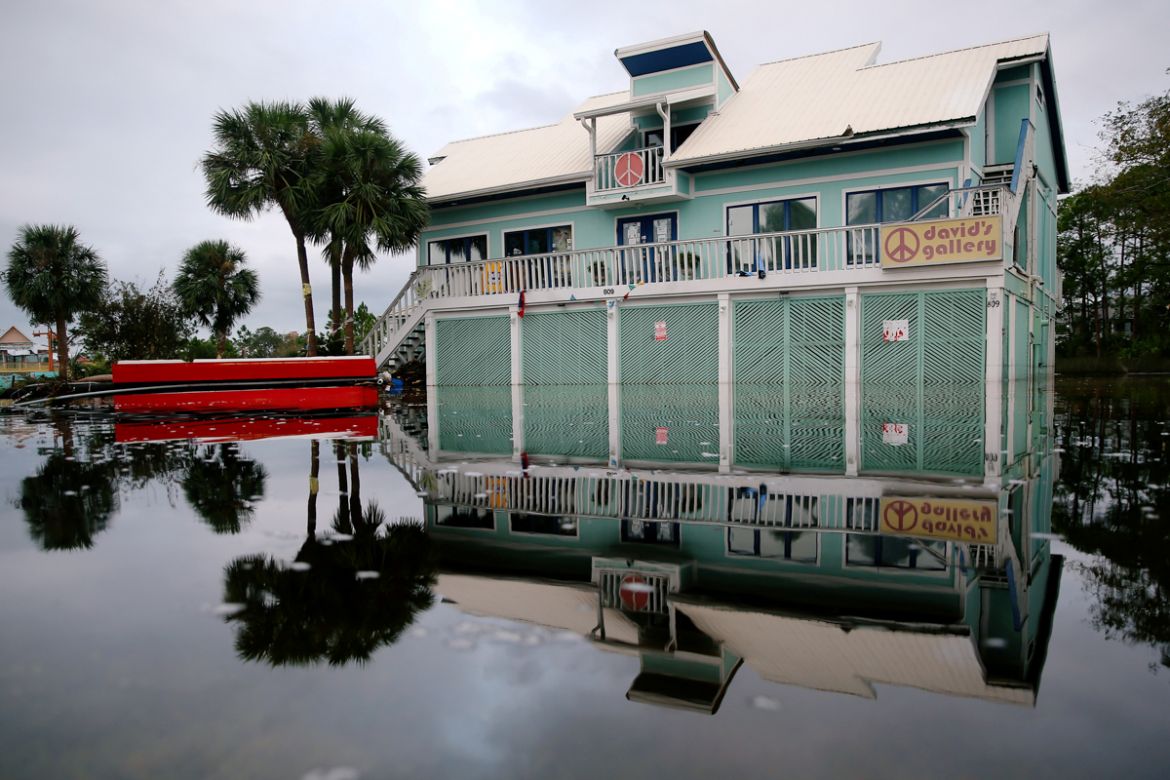 A house surrounded by flood waters is pictured after Hurricane Sally in Gulf Shores, Alabama, U.S., September 17, 2020. REUTERS/Jonathan Bachman TPX IMAGES OF THE DAY