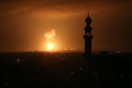 Explosion illuminates the night sky after Israeli warplanes hit several targets on August 16, 2020 in Khan Yunis, Gaza. [Abed Rahim Khatib/Anadolu]