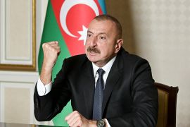 In this photo provided by the Azerbaijan&#39;s Presidential Press Office on Oct 20, 2020, Azerbaijani President Ilham Aliyev gestures as he addresses the nation in Baku, Azerbaijan [Azerbaijani Presidential Press Office via AP]