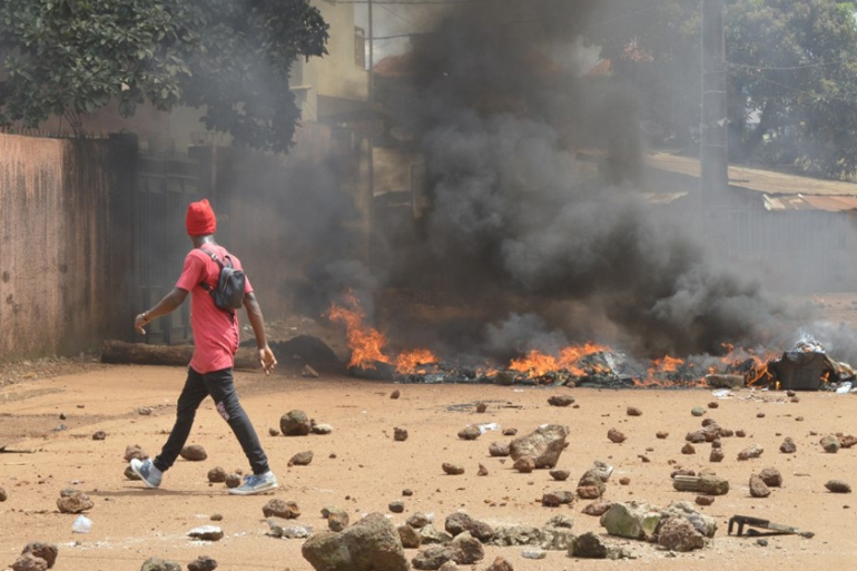 A small number of people took part in scattered demonstrations across the capital, Conakry [Cellou Binani/AFP]