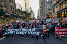Demonstrators march down Fifth Avenue to advocate for the counting of all votes on November 4, 2020, in New York [AP/Frank Franklin II]