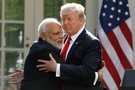 India&#39;s Prime Minister Narendra Modi hugs US President Donald Trump as they give joint statements in the Rose Garden of the White House in Washington, US, June 26, 2017. [Kevin Lamarque/Reuters]