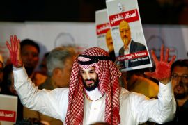 A demonstrator wearing a mask of Saudi Crown Prince Mohammed bin Salman attends a protest on October 25, 2018, outside the Saudi Arabia consulate in Istanbul, Turkey, where Saudi journalist Jamal Khashoggi was murdered [Osman Orsal/Reuters]