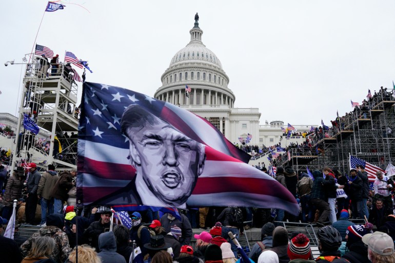Pro-Trump protesters storm the grounds of the US Capitol, in Washington, DC on January 6, 2021. 
