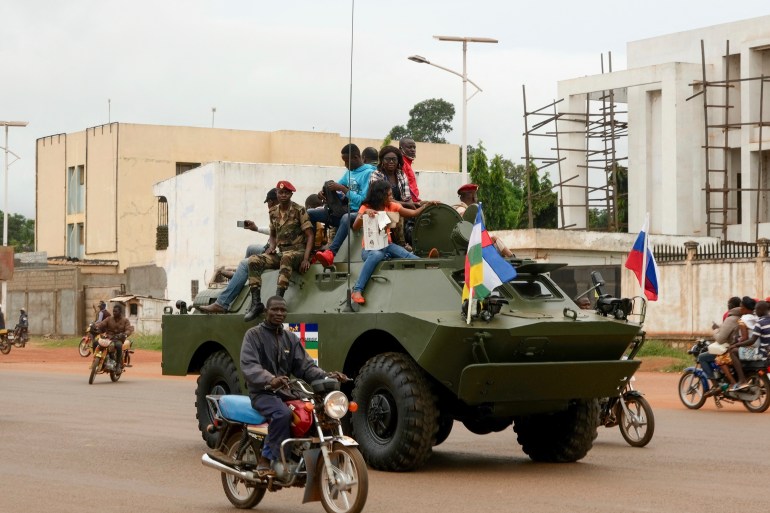 A Russian armoured personnel carrier (APC) is seen driving in the street during the delivery of armoured vehicles to the Central African Republic army in Bangui, Central African Republic