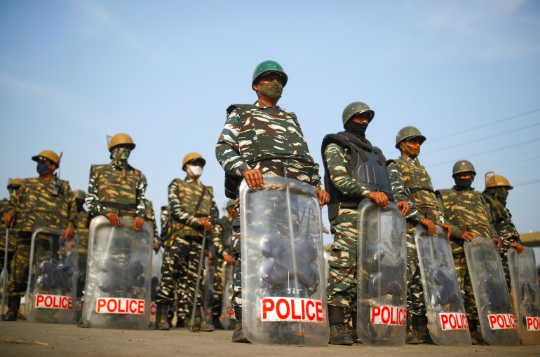 Indian police officers in riot gear 