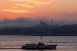 A ferry sails through Bosphorus