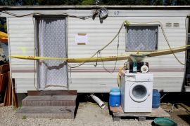 A pre-fabricated home with Police tape blocking entry is seen in an official Roma camp in Rome, Italy June 27, 2018 [Tony Gentile/Reuters]