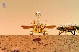 Chinese rover Zhurong and the lander of the Tianwen-1 mission, captured on the surface of Mars by a camera detached from the rover