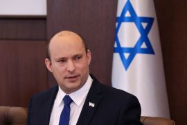 Israeli Prime Minister Naftali Bennett chairs the first weekly cabinet meeting of the new government in Jerusalem, Sunday, June 20, 2021. [Emmanuel Dunand/Pool Photo via AP]