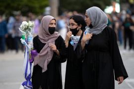 Muslims attend a vigil for the victims of an attack