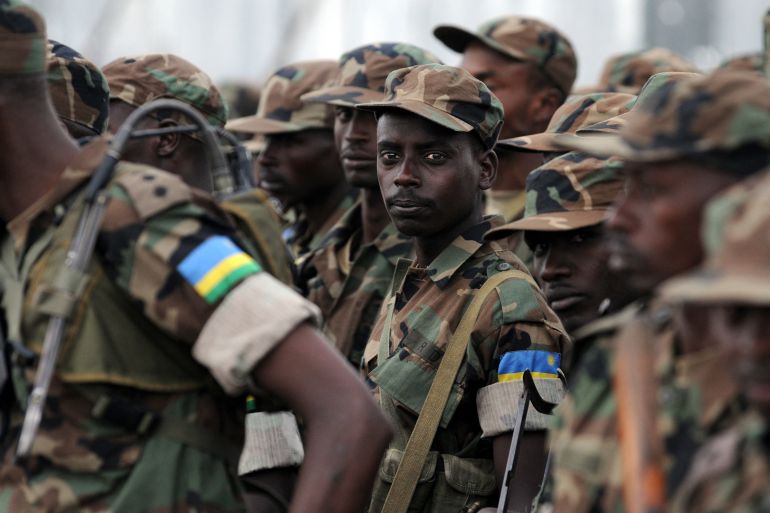 Rwandan soldiers attend a ceremony on February 25, 2009 in Goma, Democratic Republic of Congo.