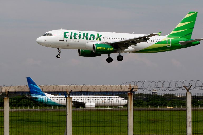 A Citilink Airbus A320 approaches for a landing at Soekarno–Hatta International Airport in Jakarta June 14, 2013.