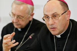 The head of Poland&#39;s Catholic Church Archbishop Wojciech Polak, right, addresses the media during a news conference in Warsaw, Poland in March 2019. Archbishop Wojciech Polak apologised to survivors of sexual abuse at the hands of Catholic Church clergy and asked for forgiveness [File: Czarek Sokolowski/AP Photo]