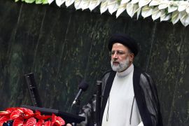 President Ebrahim Raisi delivers a speech at the parliament in Tehran