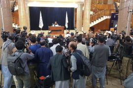 Media and Taliban officials are seen as Taliban spokesperson Zabihullah Mujahid holds a press conference in Kabul, Afghanistan on September 07, 2021 to announce the formation of a caretaker government [Sayed Khodaiberdi Sadat/Anadolu Agency via Getty Images]