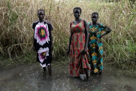 Three women pose