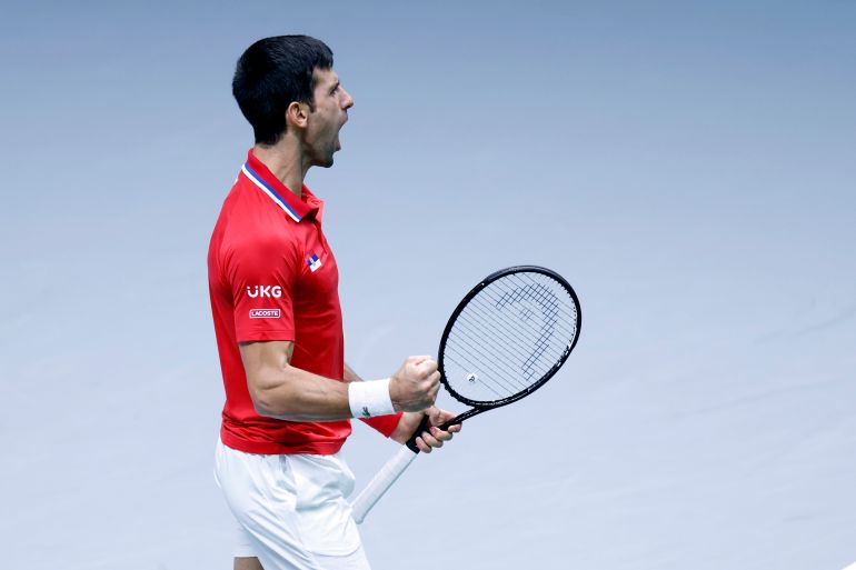 Tennis player Novak Djokovic reacts during a match