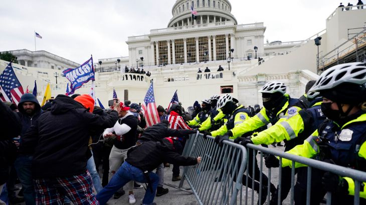 Supporters of Donald Trump riot at the US Capitol on January 6, 2021.
