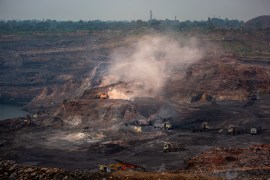 Mining is in progress at an open-cast mine near Dhanbad, an eastern Indian city in Jharkhand state, Friday, Sept. 24, 2021.