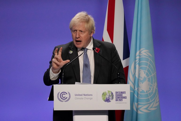 British Prime Minister Boris Johnson gives a press conference at the COP26 U.N.
