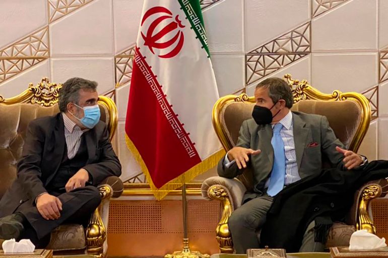 Director General of International Atomic Energy Agency, IAEA, Rafael Mariano Grossi, right, speaks with deputy head of the Atomic Energy Organization of Iran Behrouz Kamalvandi