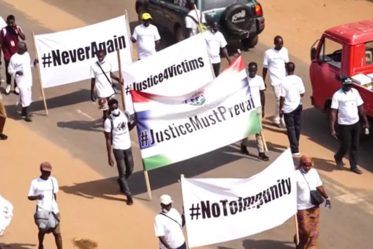 Protest by realtives of victims of the regime of Yahya Jammeh, the former President of the Gambia [Screen grab/ Al Jazeera]