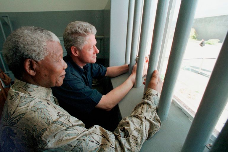 Nelson Mandela and Bill Clinton