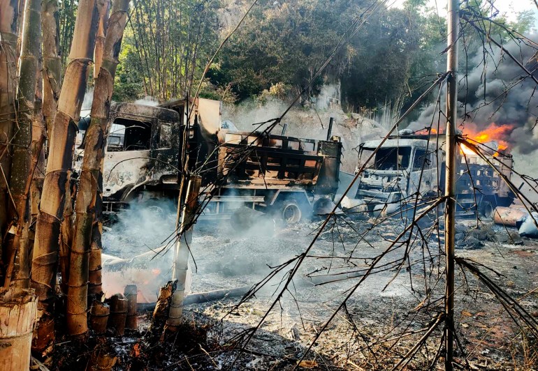 Smoke and flames billow from vehicles in Hpruso township, Kayah state, Myanmar